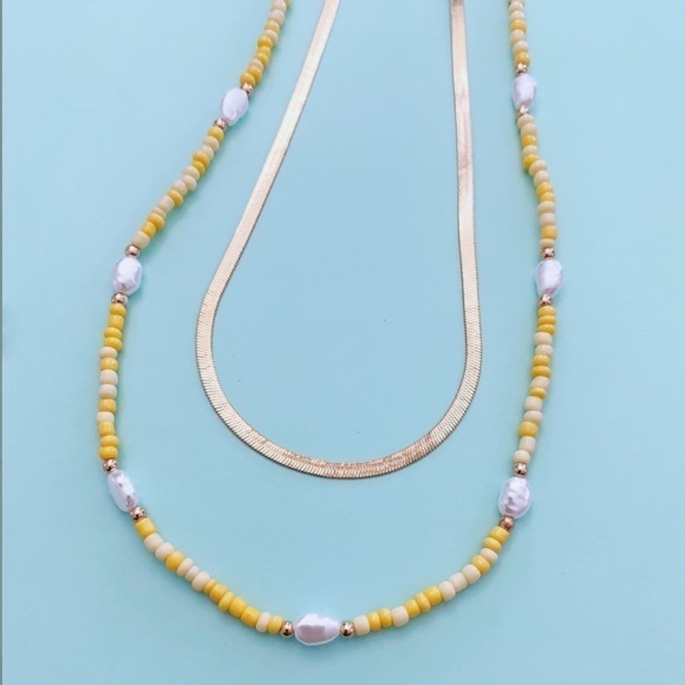 Gold-tone 2-layer beaded charm necklace